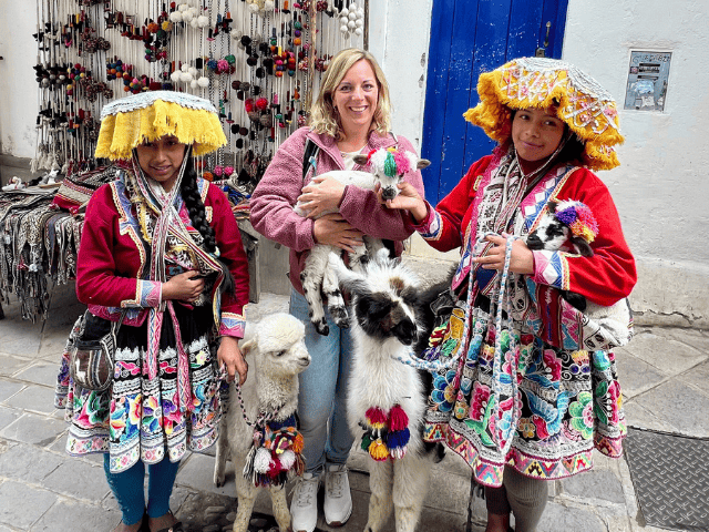 Peru Sacred Valley Pisac foto met lama's